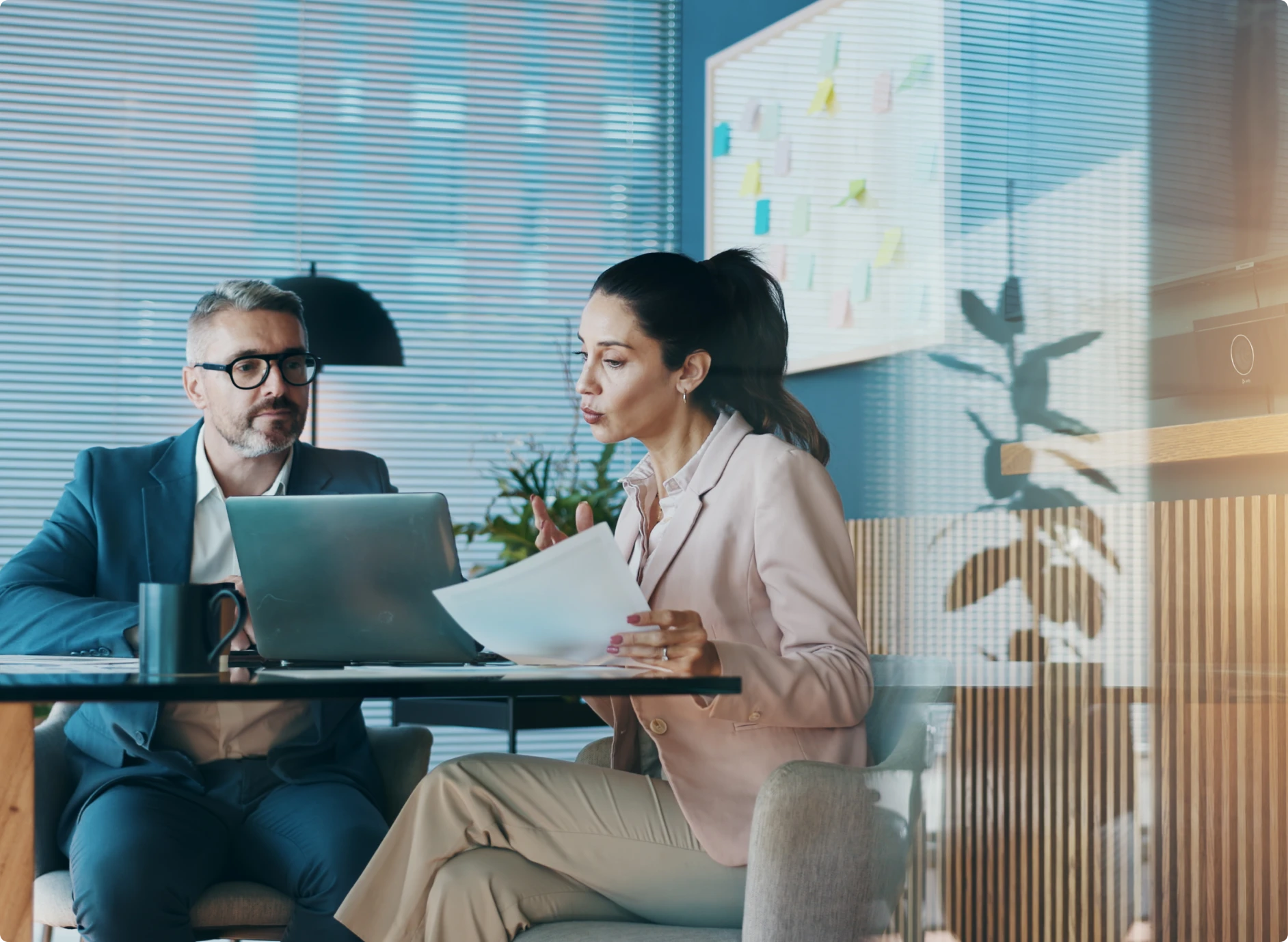 Colleagues collaborating in a stylish workspace